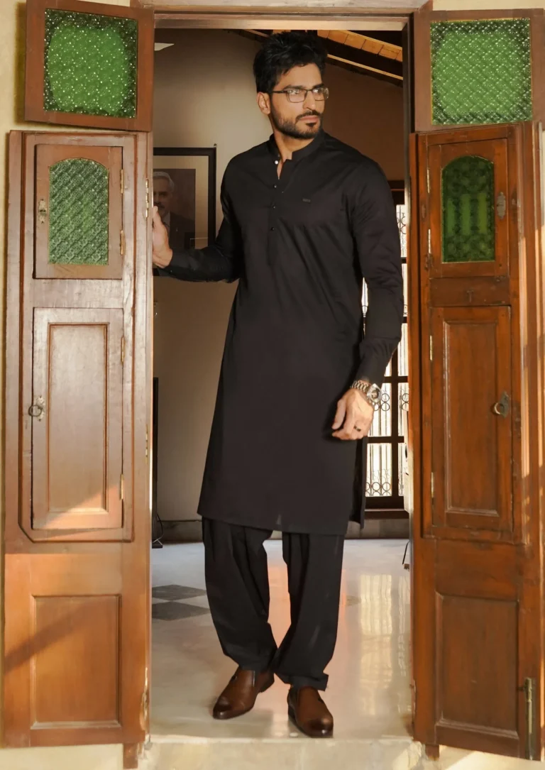 Black Shalwar Kameez with Pathan-style trousers and brown leather shoes